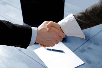 Business handshake representing a professional security partnership
